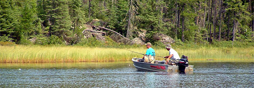 Fishing around weed beds for trophy northern in Canada